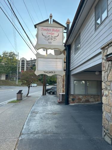 a pharmacy building with a sign on the side of it at Timber Ridge Lodge Gatlinburg in Gatlinburg