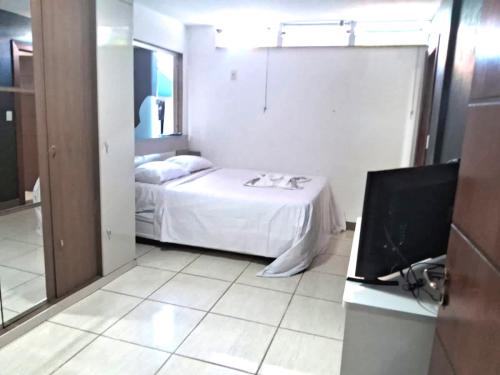 Katil atau katil-katil dalam bilik di Excelente casa a 3km do centro de Itabira