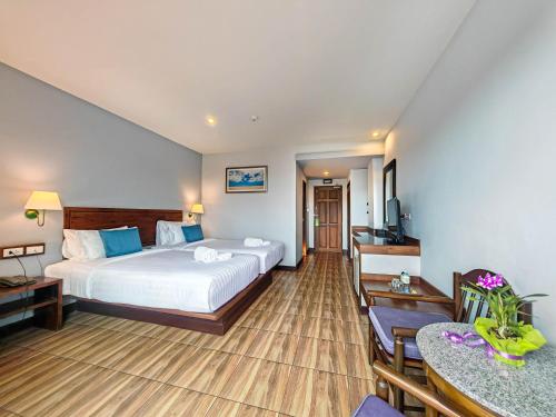 Postel nebo postele na pokoji v ubytování Savotel Hotel