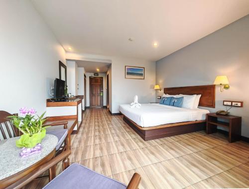 Postel nebo postele na pokoji v ubytování Savotel Hotel