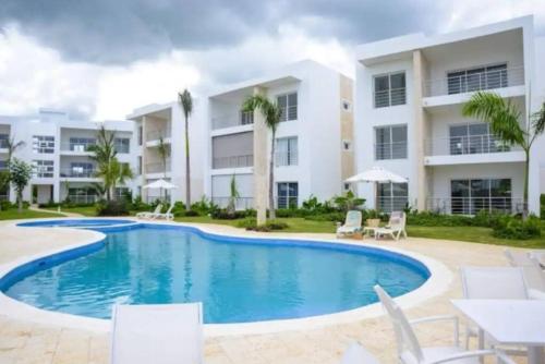Bazén v ubytování Confortable apartamento en Playa Nueva Romana nebo v jeho okolí