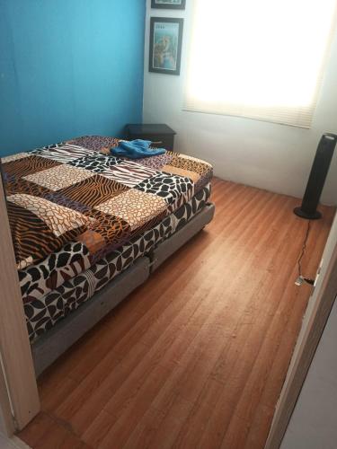 Кровать или кровати в номере Apartamento Sur Conjunto Cerrado