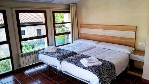 Postel nebo postele na pokoji v ubytování La Villa