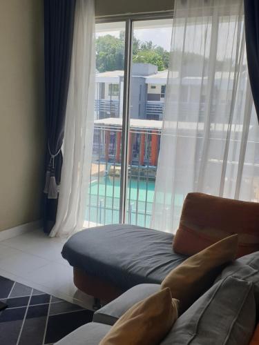 Χώρος καθιστικού στο Cyberia Crescent Cyberjaya -3 Bedroom 8 pax