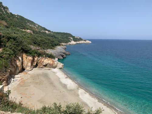 a view of a beach with the ocean at Pelion 7 Lives in Tsagarada