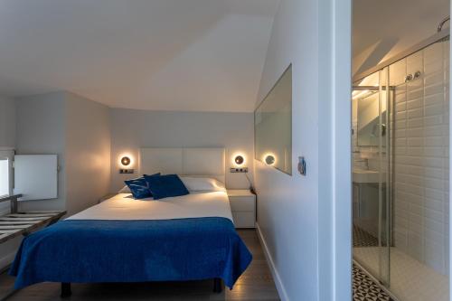 Letto o letti in una camera di Hotel&Spa El Puerto