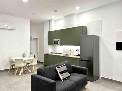 Η κουζίνα ή μικρή κουζίνα στο Apartamentos La Tahona Cádiz Centro