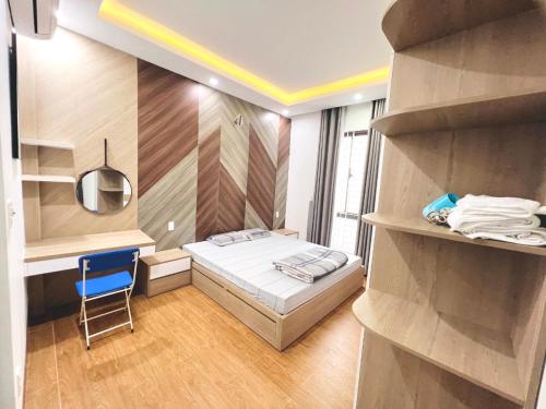 Katil atau katil-katil dalam bilik di KenppiC Homestay-Đậu nhiều ô tô