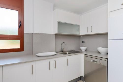 Dapur atau dapur kecil di Apartamentos Tossa Dreams by Pandora Hoteles