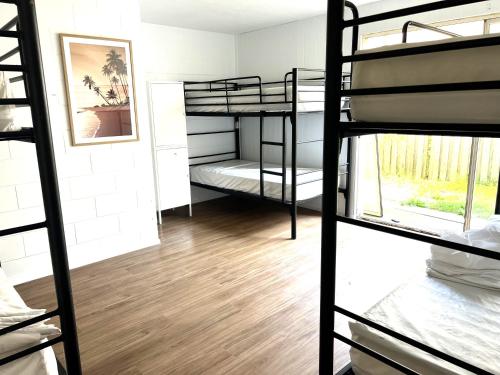Katil atau katil-katil dalam bilik di CALI Backpackers