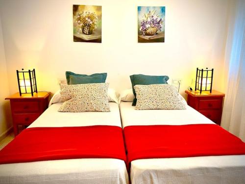 Giường trong phòng chung tại MyChoice ElCano by Bossh! Apartments