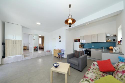 Kuchyň nebo kuchyňský kout v ubytování Horizonte apartman