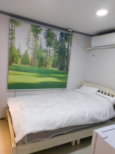 Katil atau katil-katil dalam bilik di Ara Guesthouse