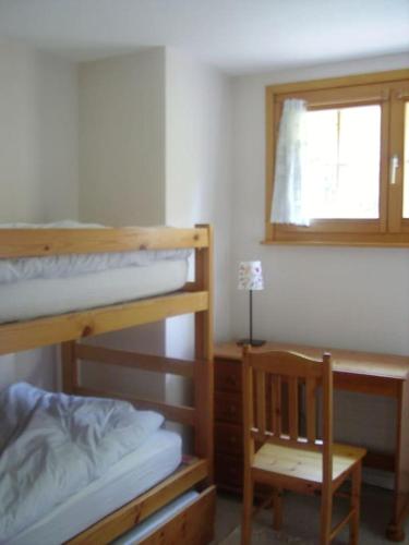 Katil atau katil-katil dalam bilik di apartment with big garden and stunning view Chesieres