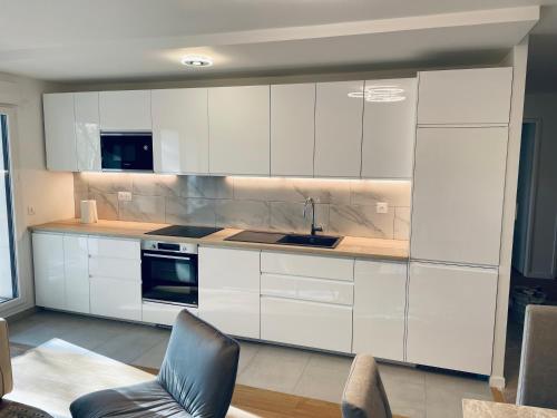 Photo de la galerie de l'établissement 5 Pièces luxe à 300m de Paris et proche Stade de France avec parking exclusif, à Saint-Ouen