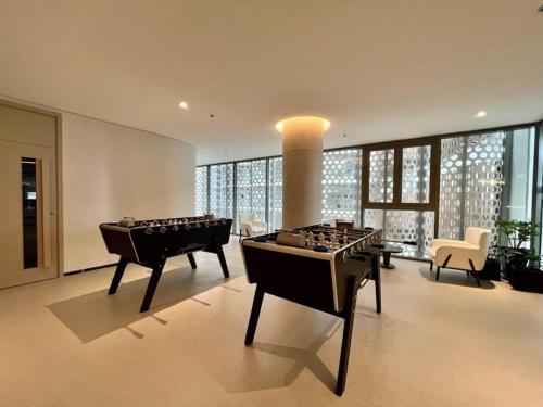 Ein Sitzbereich in der Unterkunft The sóng house vũng tàu Apartment