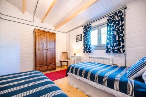Llit o llits en una habitació de The Cabin, Parham