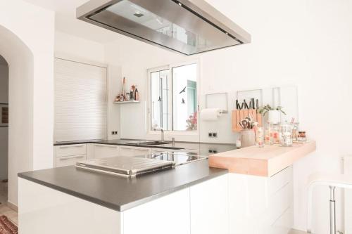 Dapur atau dapur kecil di Villa d’exception Saint-Florent vue mer