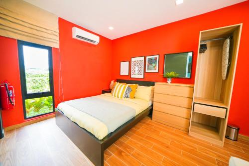 Кровать или кровати в номере Hangouts Urban+Eco Langkawi
