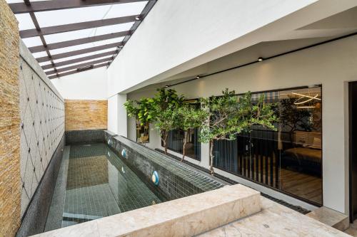 an external view of a house with a swimming pool at Aquarius Motel in Taichung