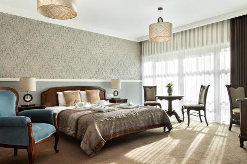 Posteľ alebo postele v izbe v ubytovaní Hotel Spa Laskowo