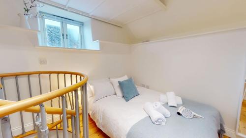 Postel nebo postele na pokoji v ubytování The Dovecote