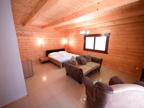 Postel nebo postele na pokoji v ubytování SKI CIERNY BALOG