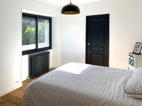 Postel nebo postele na pokoji v ubytování L'Auberge du Ranc