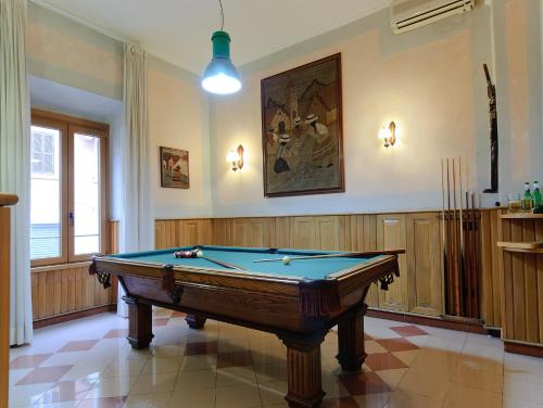 a billiard room with a pool table in it at Hotel Museum in Rome