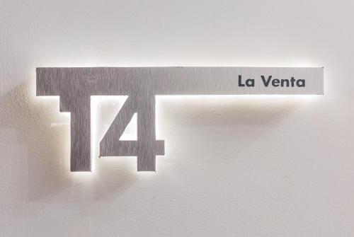 a sign that reads la venta on a wall at Casa Castillo in Mexico City