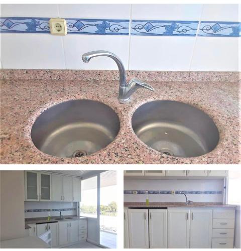 a kitchen counter with a sink in a kitchen at Cozy Flat W/ Mountain View [Monthly Discount] in Antalya