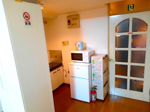 Köök või kööginurk majutusasutuses Shinjuku Harusame Apartment -Twin room-