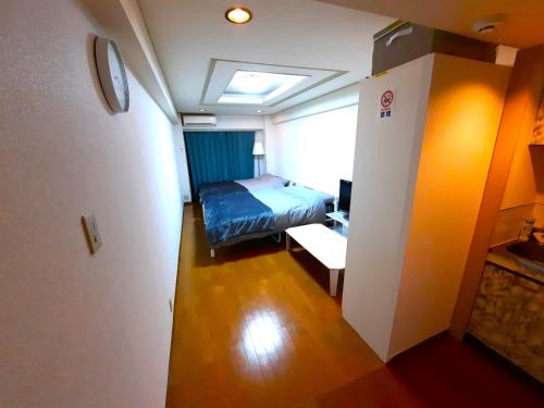 Voodi või voodid majutusasutuse Shinjuku Harusame Apartment -Twin room- toas