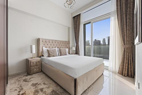 Postel nebo postele na pokoji v ubytování VayK - Elegant 1 Bedroom with Burj Khalifa View