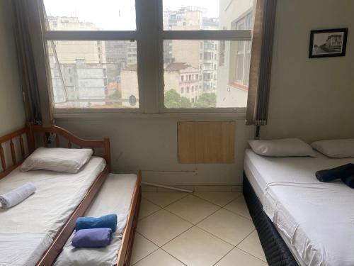 Ein Bett oder Betten in einem Zimmer der Unterkunft S805-Lapa