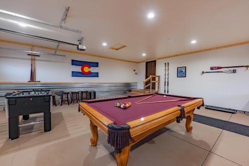 a pool table in a room with a ping pong ball at Buena Vista Mountain Retreat - Ultimate Privacy with Spa & Unbeatable Views in Buena Vista