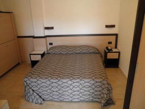 Albergo Il Giardinoにあるベッド