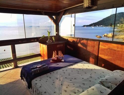 Novidade na Booking.com Beira-mar · Praia privativa Casa pé na areia com pôr do sol exclusivo. Menor preço em Novidade na Booking.com Beira-mar · Praia privativa Casa pé na areia com pôr do sol exclusivo.