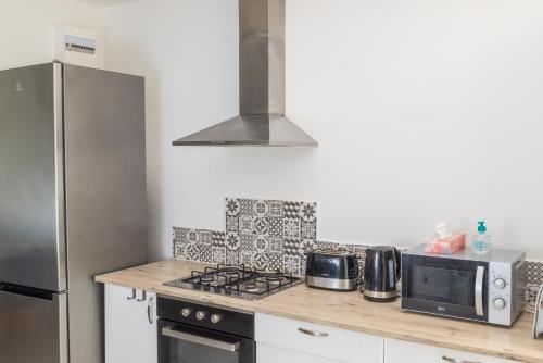 Photo de la galerie de l'établissement Grande maison familiale avec jardin, à Loos