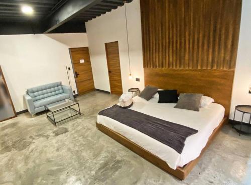 Un pat sau paturi într-o cameră la Loft cromo en excelente ubicación!