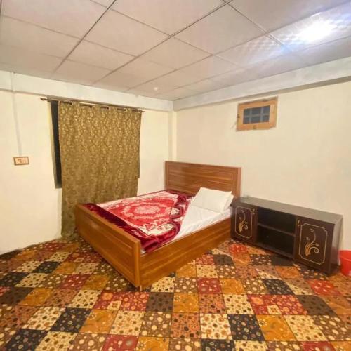 Ένα ή περισσότερα κρεβάτια σε δωμάτιο στο Finger Peak Hotel