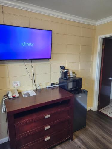 Cuisine ou kitchenette dans l'établissement Galaxie Motel
