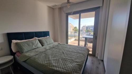 A bed or beds in a room at Villamartin Orihuela Costa La Zenia nice apartment! !