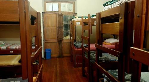 a room with a bunch of bunk beds at BB&B Hostel in La Paz