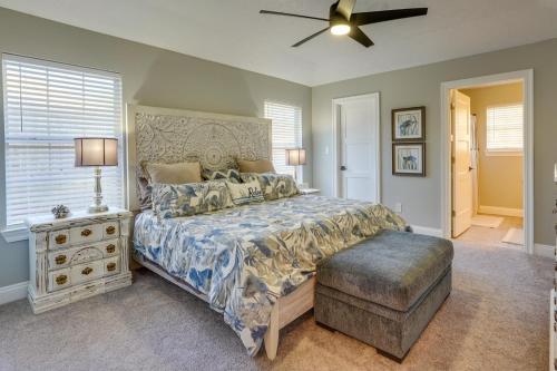 a bedroom with a bed and a ceiling fan at Family-Friendly PCB Vacation Rental, Walk to Beach in Panama City Beach