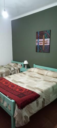 Ένα ή περισσότερα κρεβάτια σε δωμάτιο στο HOTEL PARAISO