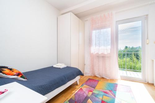 Postel nebo postele na pokoji v ubytování Holiday house with a parking space Zadar - 11744