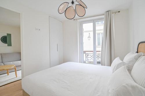 En eller flere senge i et værelse på le Marais