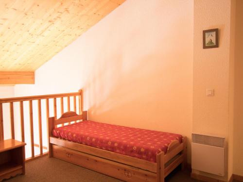 a small room with a bed on a staircase at Appartement Aussois, 4 pièces, 8 personnes - FR-1-508-83 in Aussois