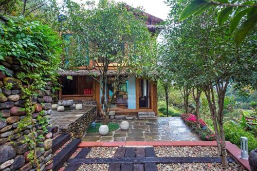 Un jardín fuera de Ethnic Hundred-years Elysian Culture&Art Scholar Resorts